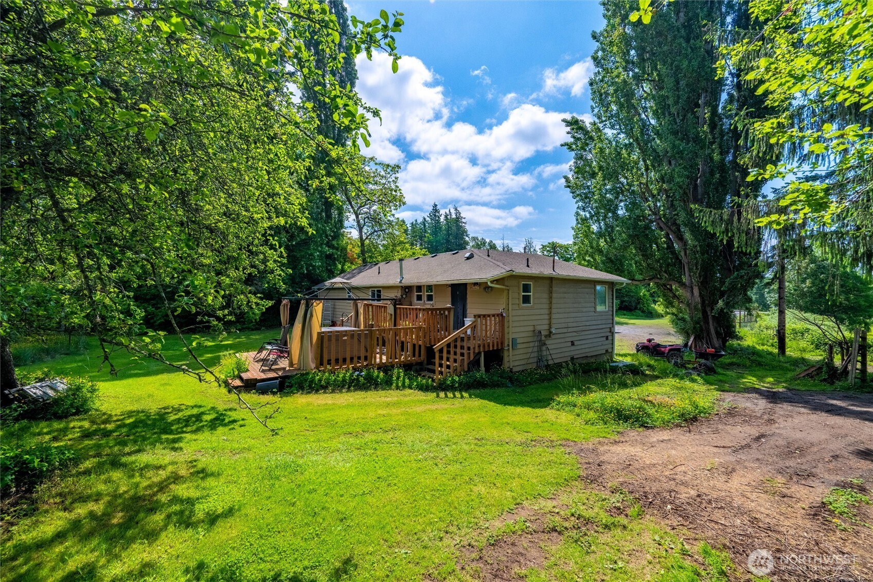970 East Bakerview Road Bellingham, WA 98226 - Photo 4 of 16 a view of a house with a yard