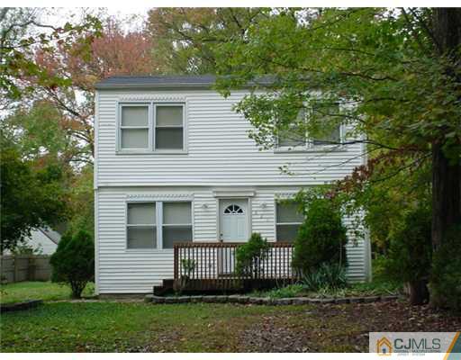 620 Myrtle Road North Brunswick, NJ 08902 - Photo 1 of 1 a front view of a house with a yard