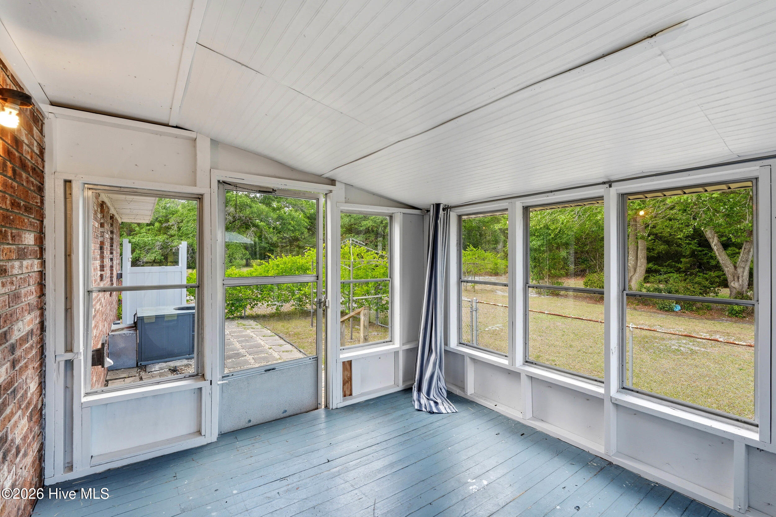 879 Bricklanding Road Southwest Shallotte, NC 28470 - Photo 28 of 56 Screened porch
