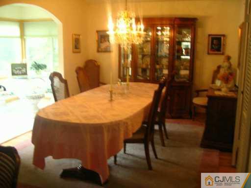 47 Wilk Road Edison, NJ 08837 - Photo 2 of 8 a dining room with furniture and window