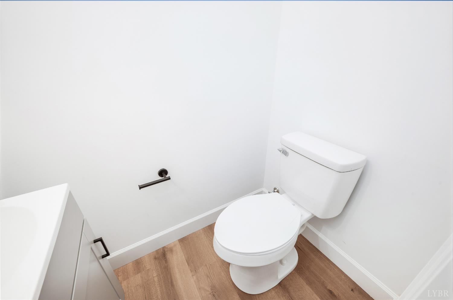 11218 Leesville Road Evington, VA 24550 - Photo 4 of 54 a white toilet sitting next to a shower