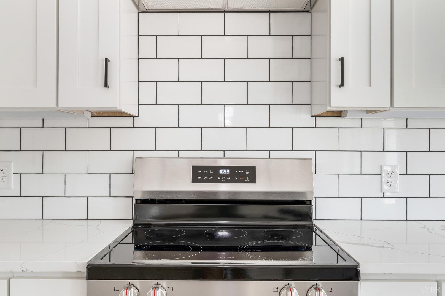 11218 Leesville Road Evington, VA 24550 - Photo 9 of 54 a stove top oven sitting inside of a kitchen