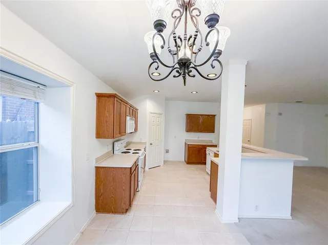 a view of living room with furniture and flat screen tv