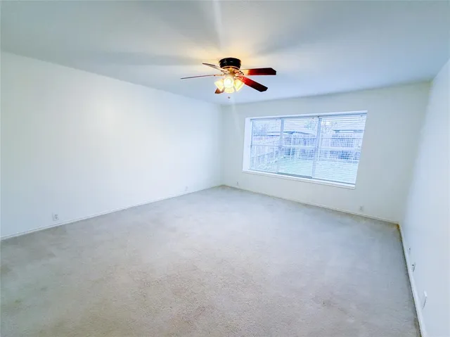 en view of an empty room with a window