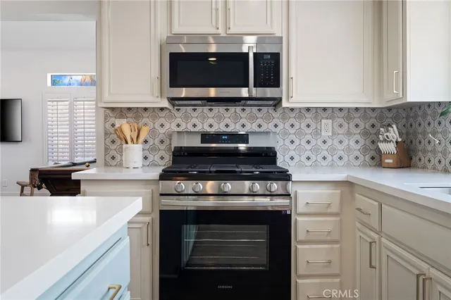 a bedroom with a bed and couch