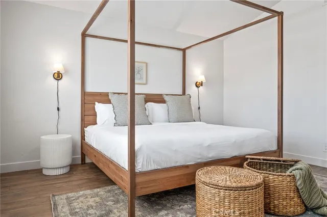 a view of a hallway with paintings on the wall