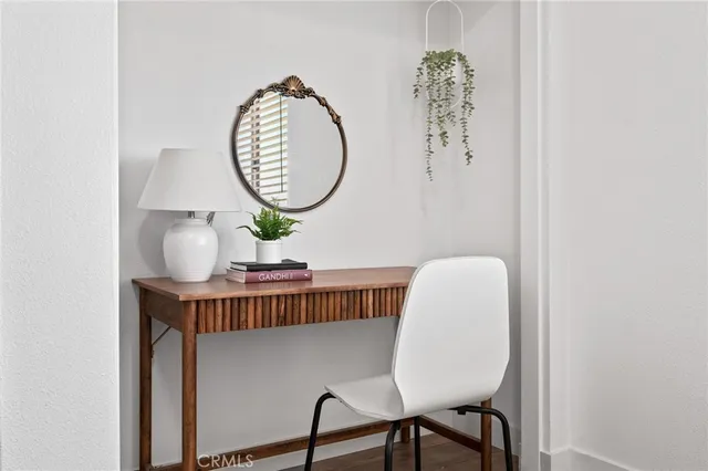 a bathroom with a granite countertop sink mirror and bathtub