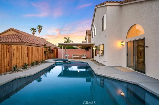 a swimming pool with a balcony