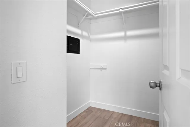 a view of a house with a yard and tree s