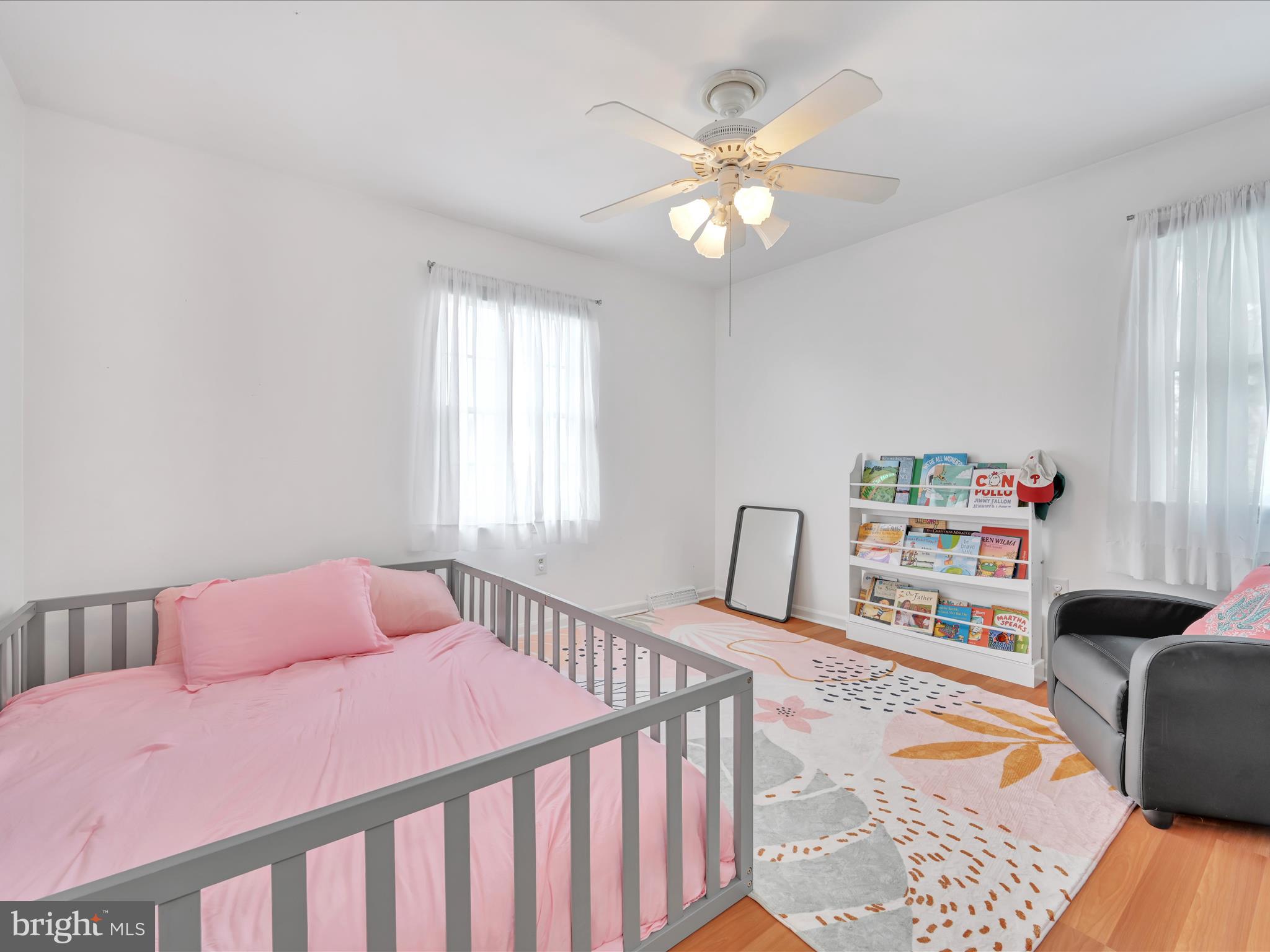 27 Flint Ridge Drive Reading, PA 19607 - Photo 24 of 31 a bedroom with a bed and a chandelier