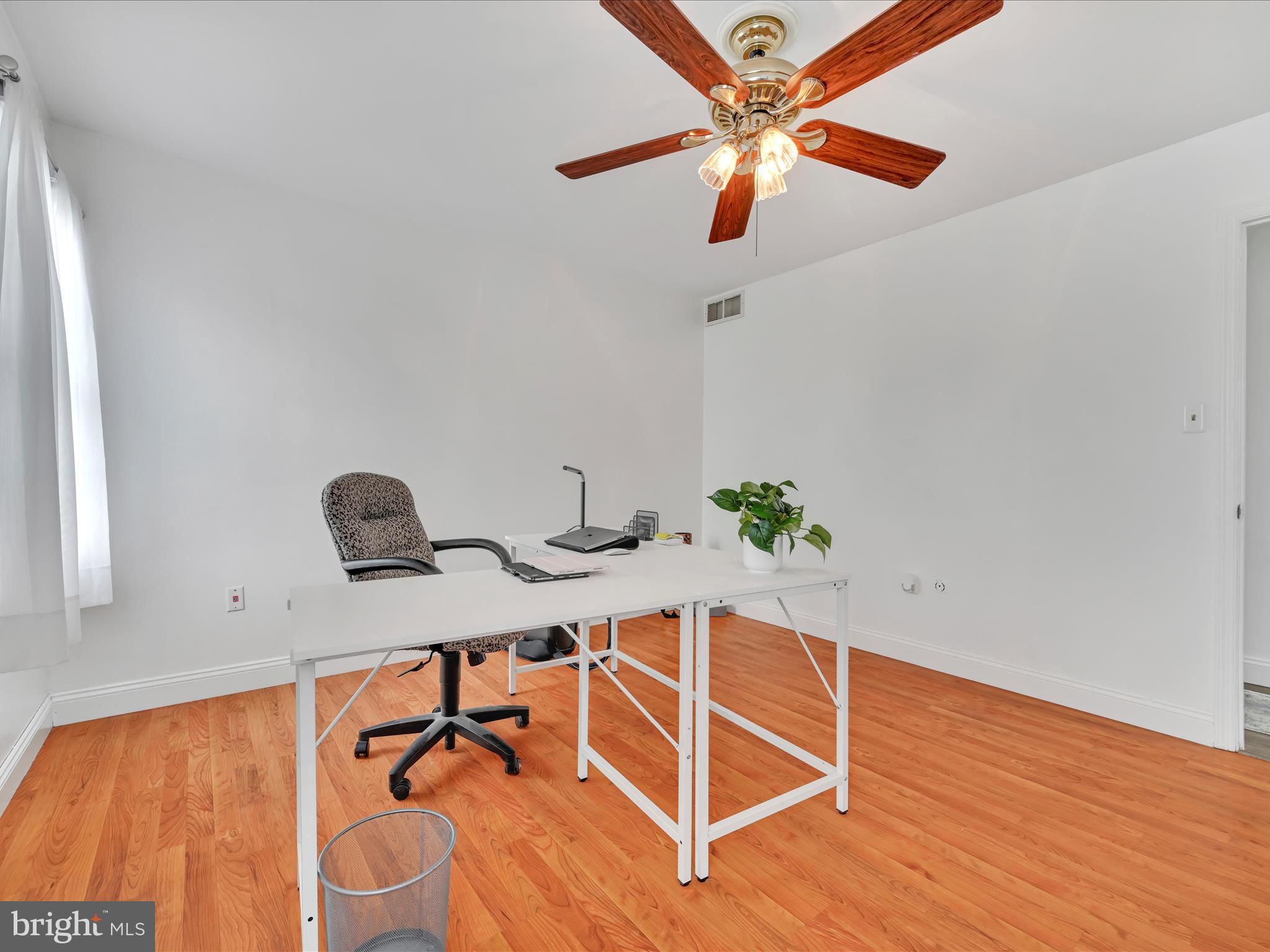 27 Flint Ridge Drive Reading, PA 19607 - Photo 26 of 31 a view of a workspace with furniture and a potted plant