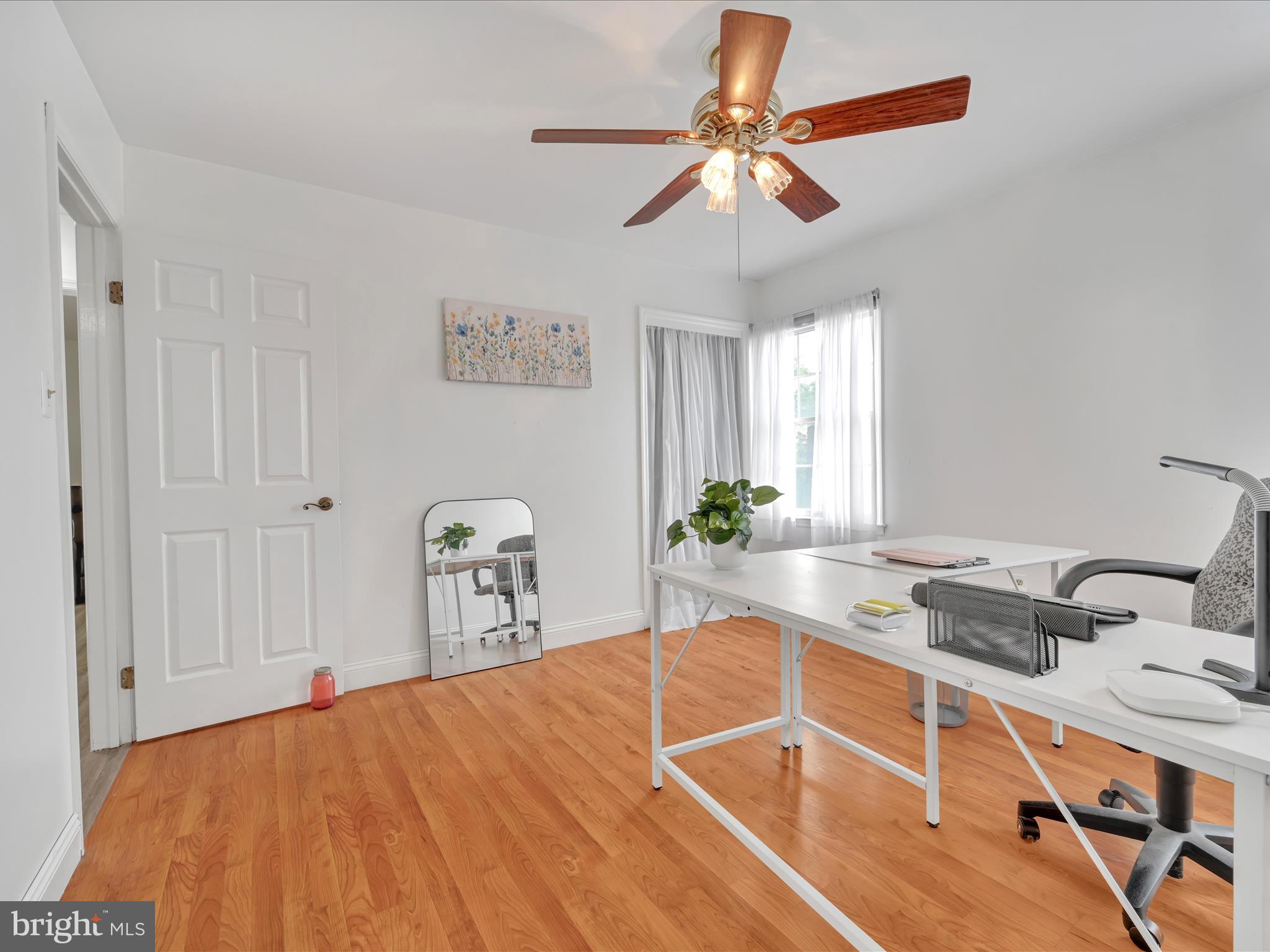 27 Flint Ridge Drive Reading, PA 19607 - Photo 27 of 31 a room with a bed and a chandelier