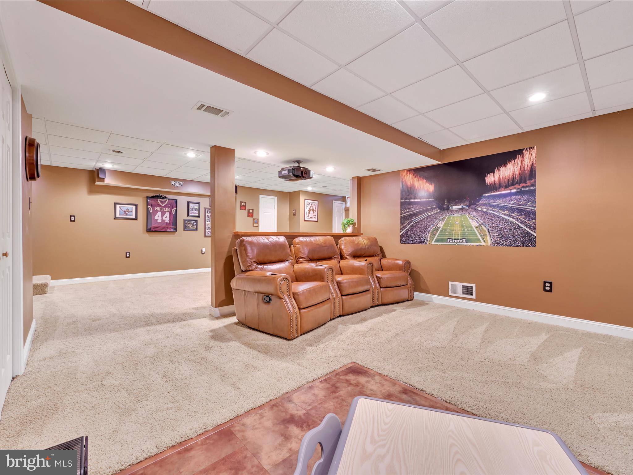 27 Flint Ridge Drive Reading, PA 19607 - Photo 28 of 31 a living room with furniture and a flat screen tv