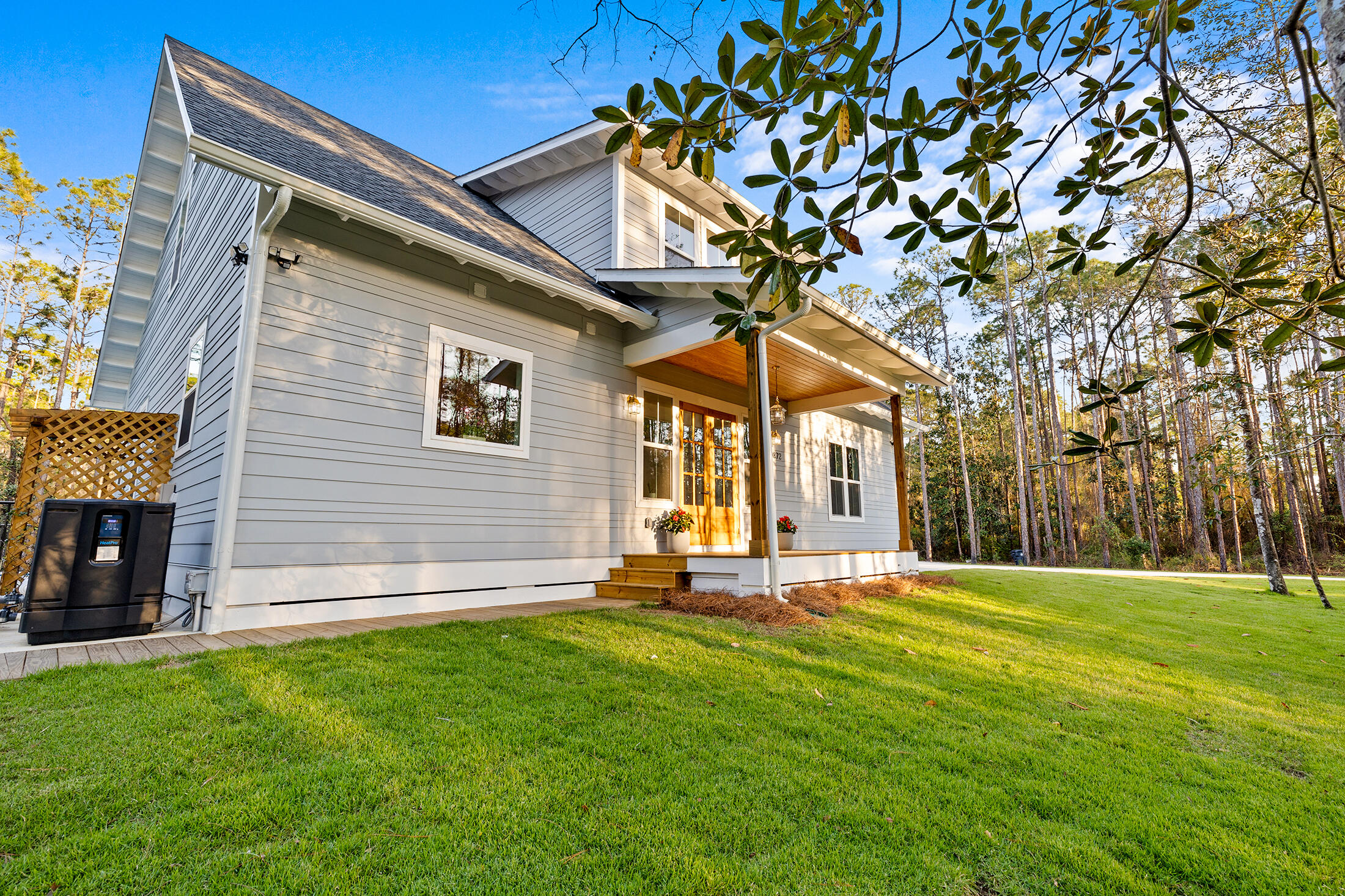 1272 Indian Woman Road Santa Rosa Beach, FL 32459 - Photo 15 of 24 a front view of a house with a yard