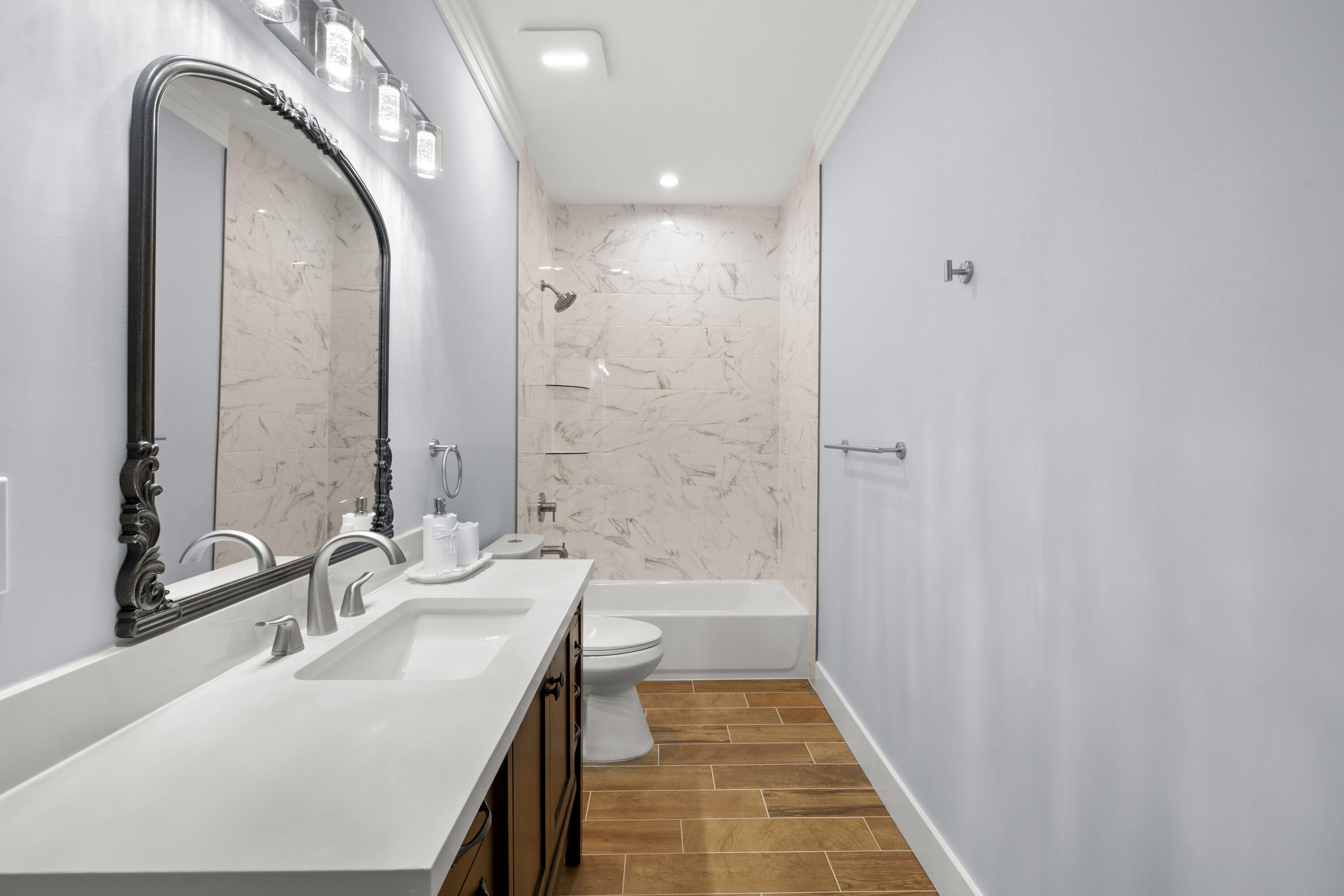 1272 Indian Woman Road Santa Rosa Beach, FL 32459 - Photo 22 of 24 a bathroom with a double vanity sink mirror and a bathtub