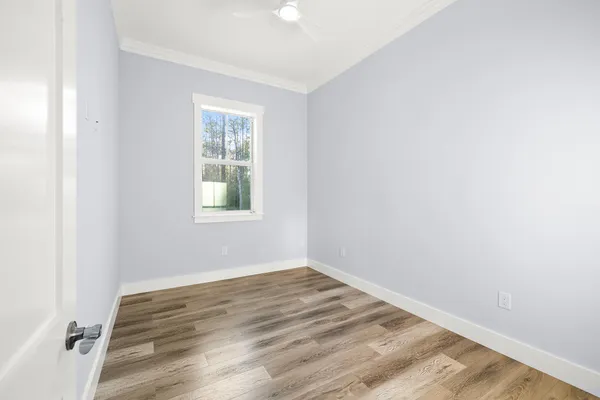 a view of a room that has a window in it