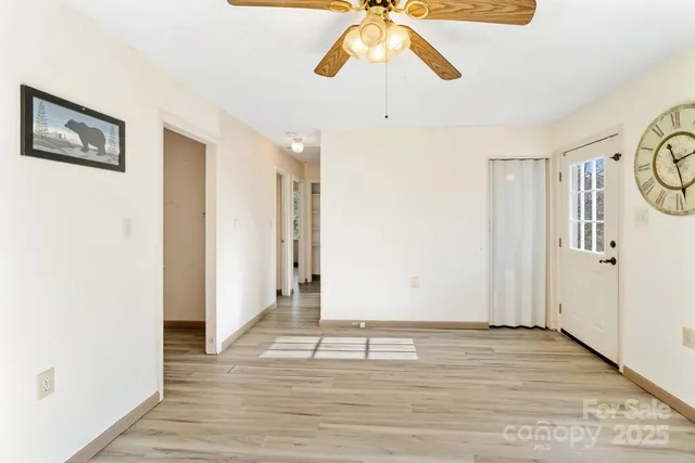 a view of an empty room and window