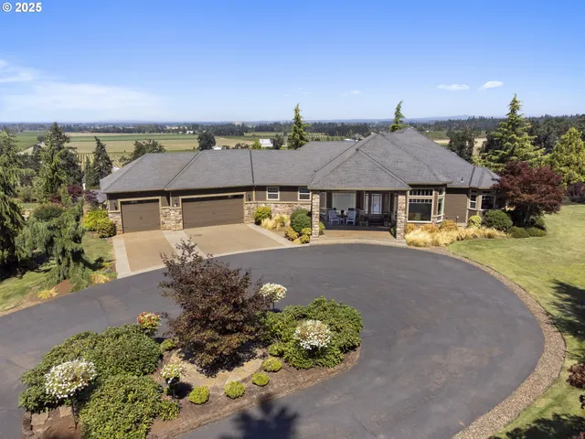 a lobby with furniture and floor to ceiling window