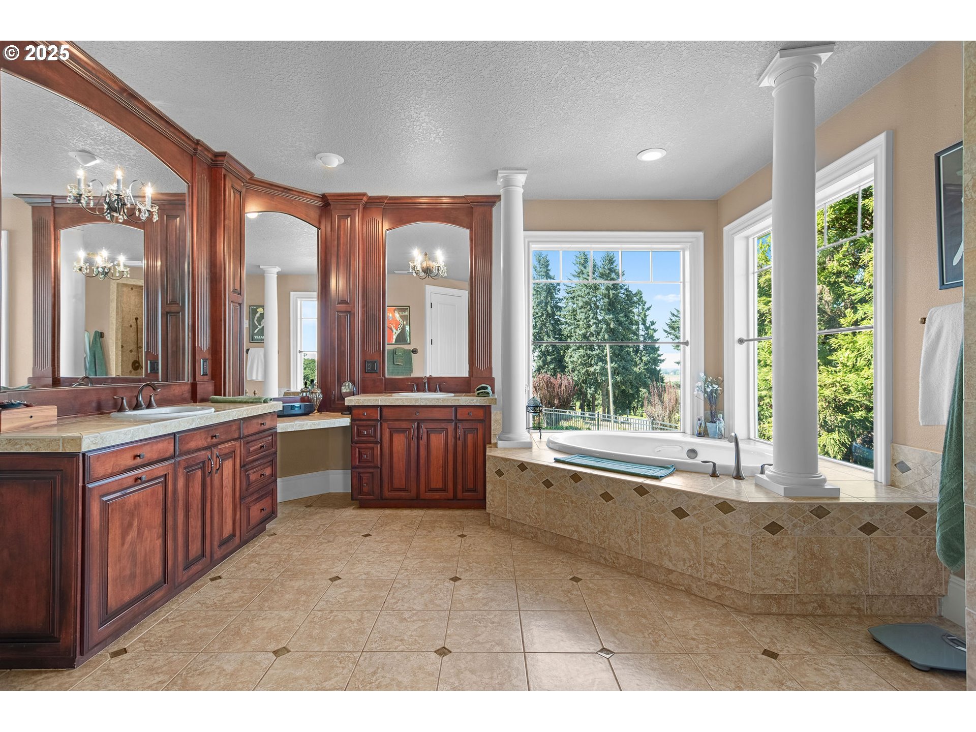 8438 Cascade Highway Northeast Silverton, OR 97381 - Photo 21 of 48 a large bathroom with a large tub and sink