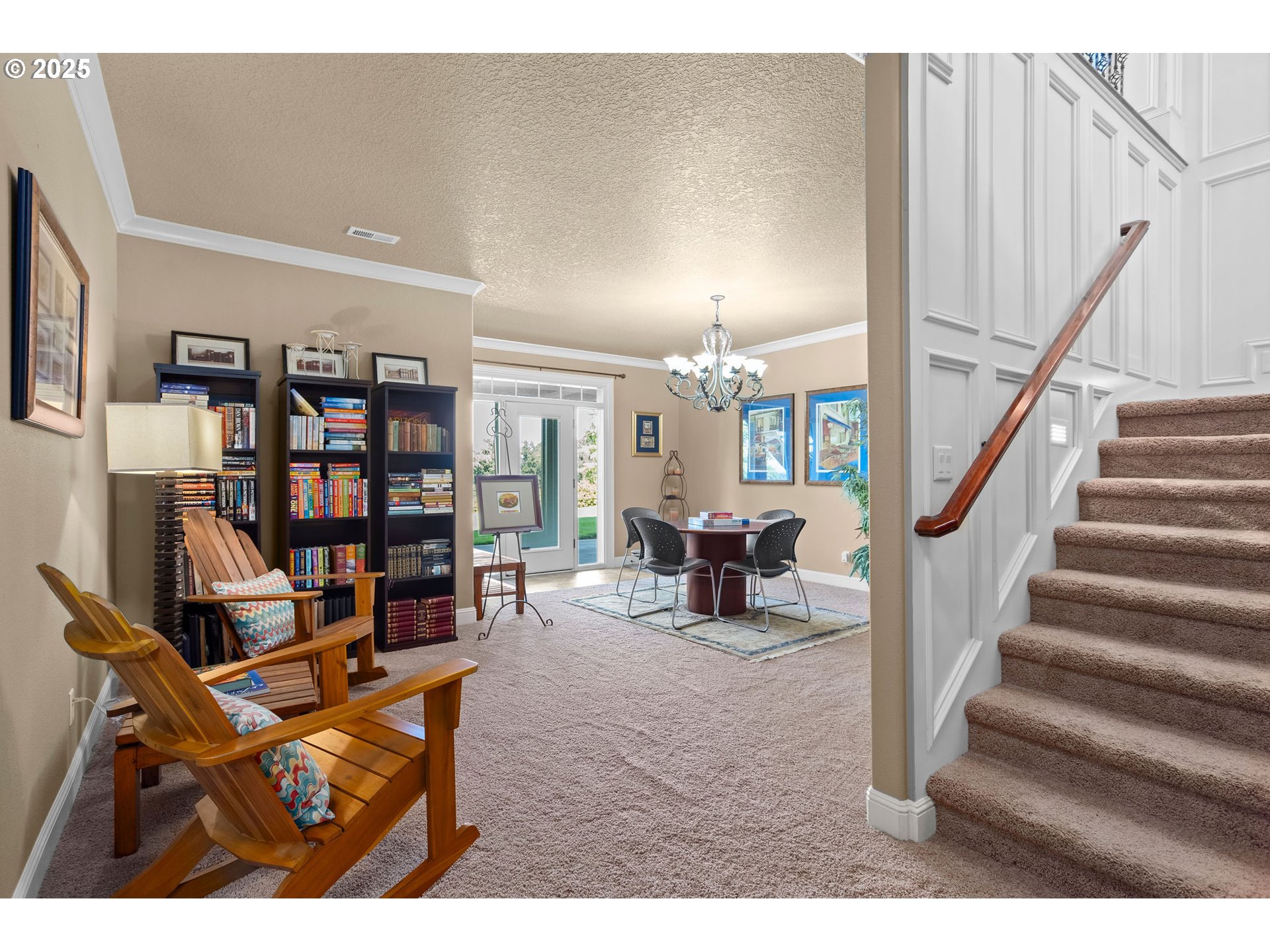 8438 Cascade Highway Northeast Silverton, OR 97381 - Photo 26 of 48 a living room with lots of furniture and a book shelf