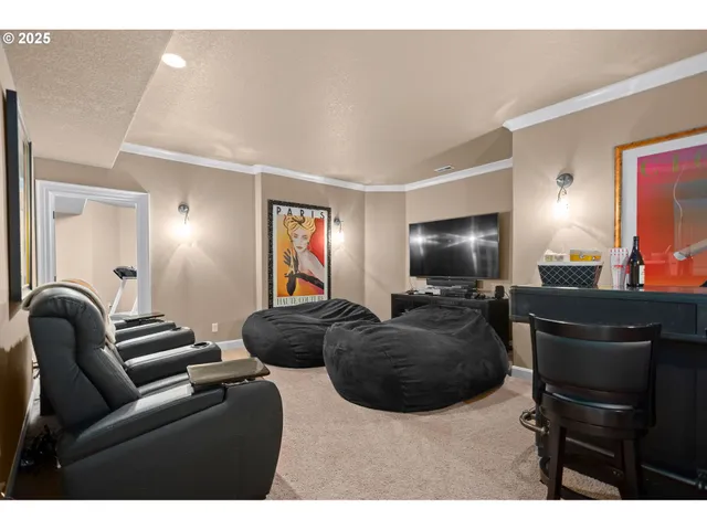 a backyard of a house with outdoor seating