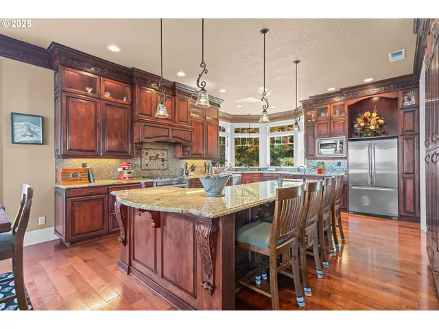 a kitchen with a stove and cabinets