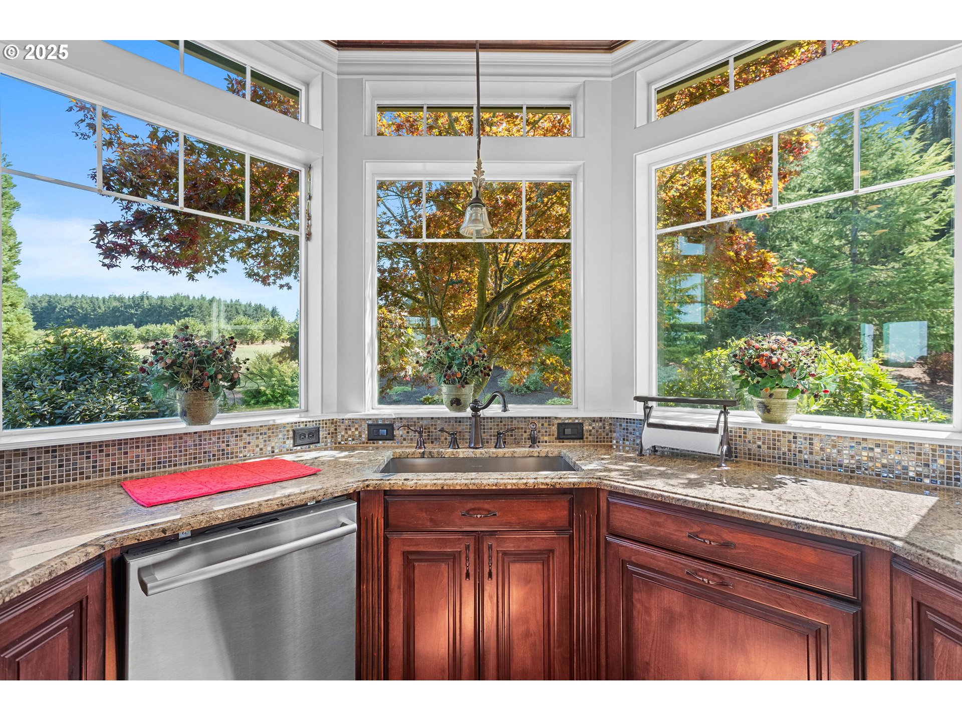 8438 Cascade Highway Northeast Silverton, OR 97381 - Photo 10 of 48 a kitchen with granite countertop a sink and a window