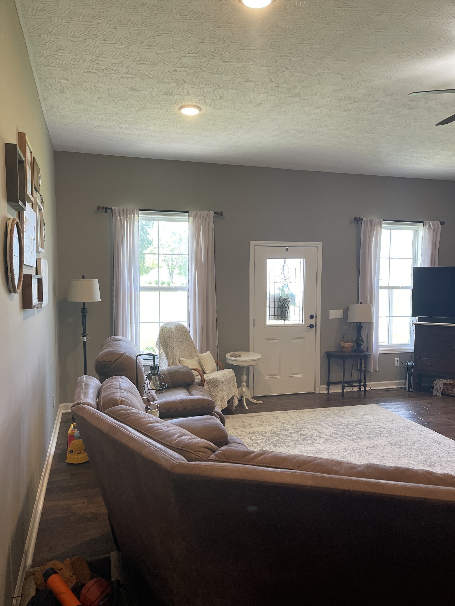 81 Butler Road Lafayette, TN 37083 - Photo 2 of 11 a living room with furniture and a large window