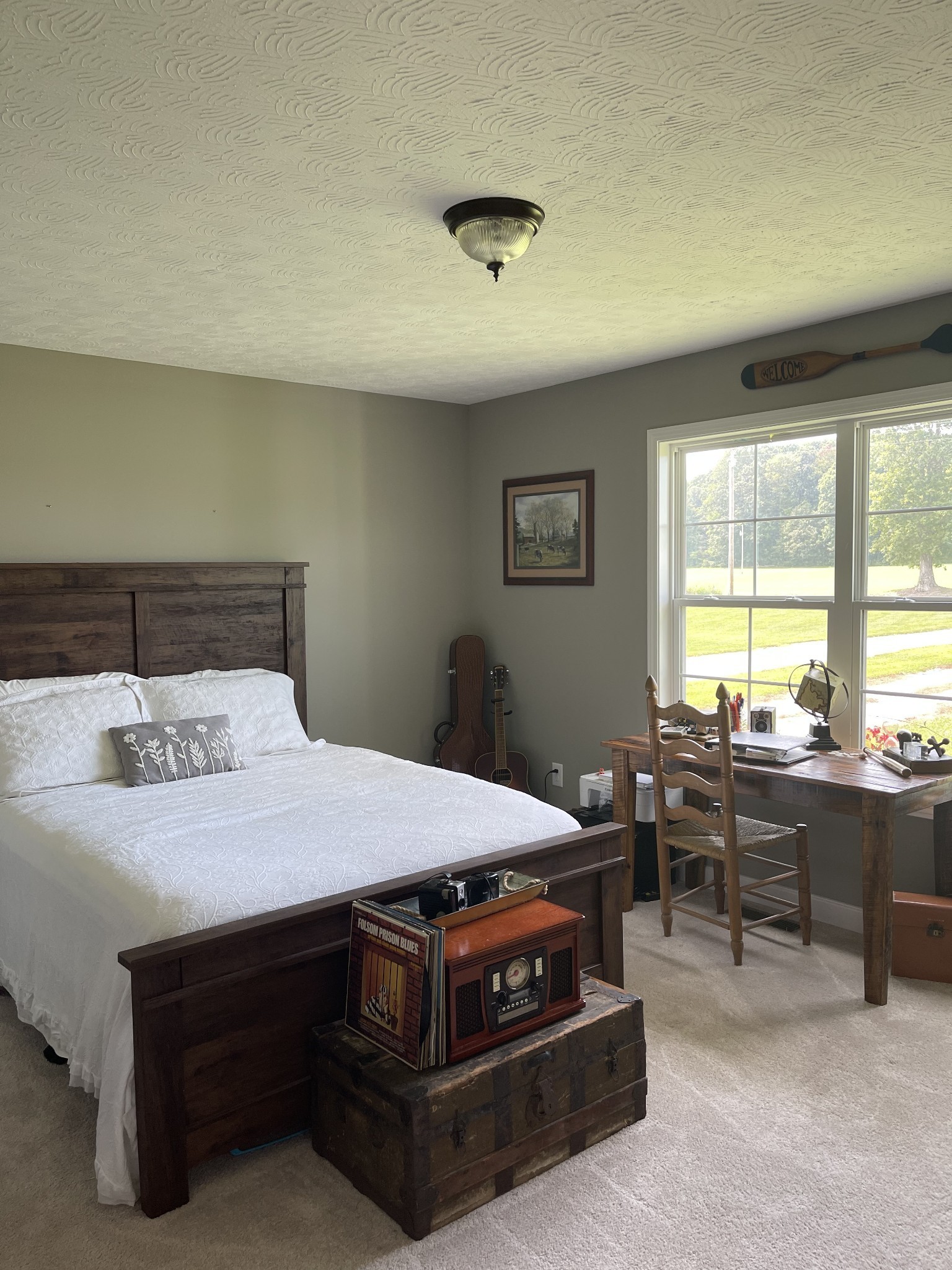 81 Butler Road Lafayette, TN 37083 - Photo 7 of 11 a bedroom with a bed and wooden floor