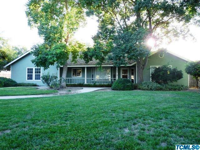 733 South Anderson Road Exeter, CA 93221 - Photo 2 of 17 a front view of house with yard and green space