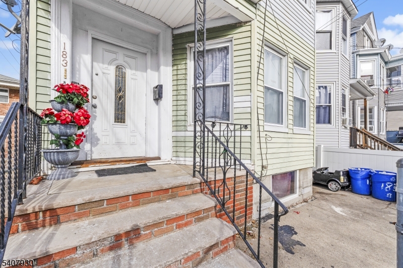 183 Walnut Street Paterson, NJ 07522 - Photo 2 of 37 a house view with a outdoor space