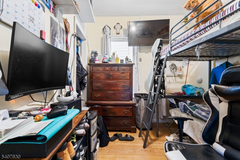 183 Walnut Street Paterson, NJ 07522 - Photo 28 of 37 a room with musical instruments