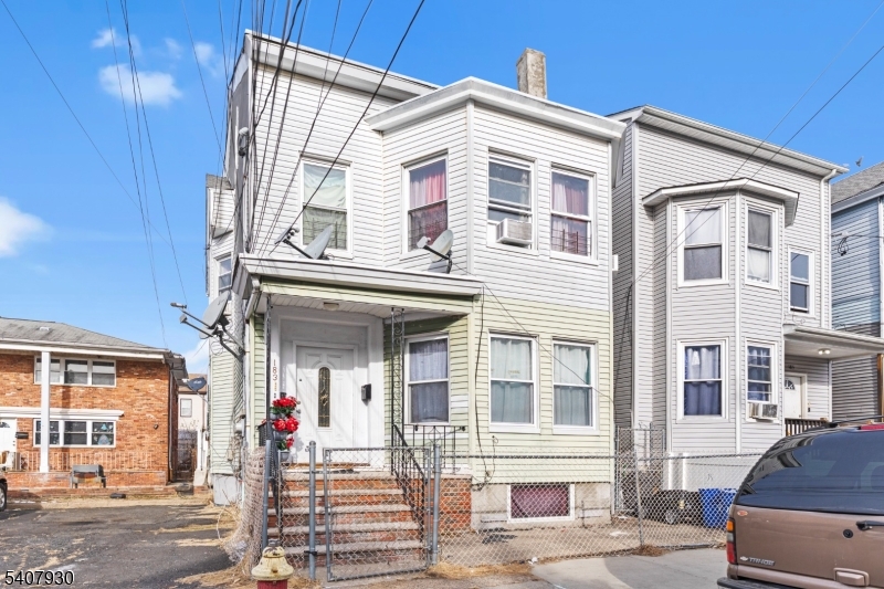 183 Walnut Street Paterson, NJ 07522 - Photo 3 of 37 a front view of a house