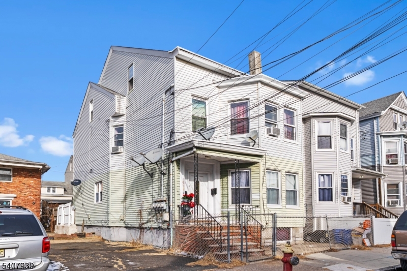 183 Walnut Street Paterson, NJ 07522 - Photo 5 of 37 a front view of a building