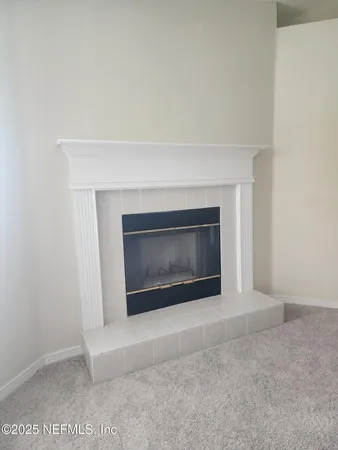 a living room with a fireplace