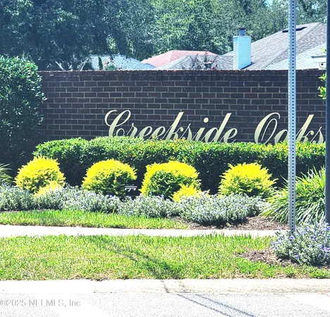 a view of a swimming pool with a garden