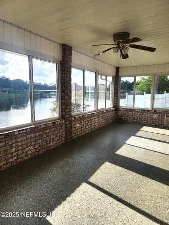 a view of an empty room and window
