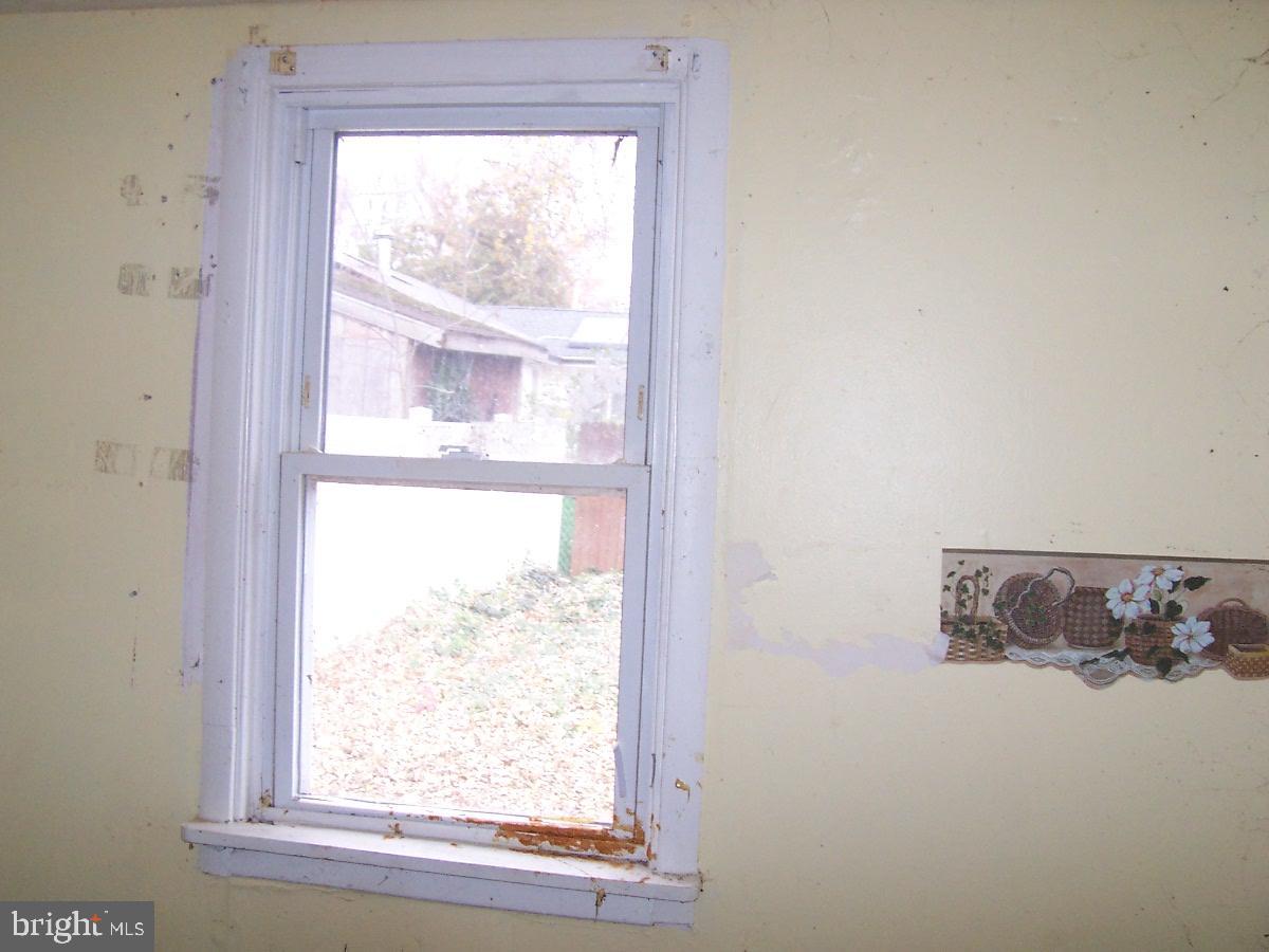172 Boston Road Pennsville, NJ 08070 - Photo 6 of 8 a view of a window in a room