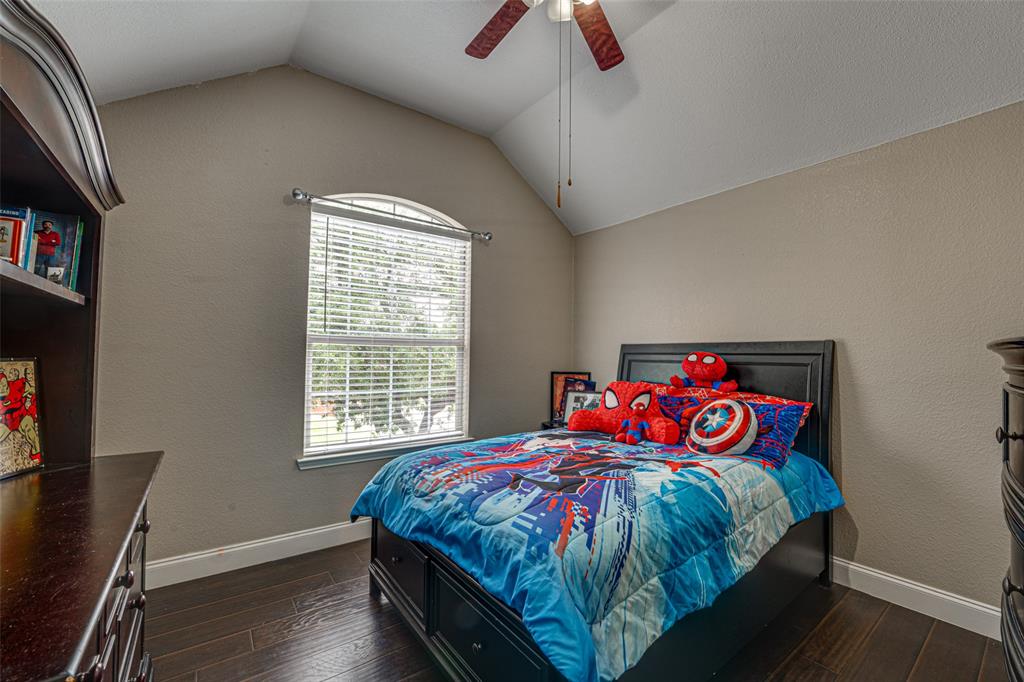 5218 Griffins Pointe Drive Rowlett, TX 75089 - Photo 27 of 40 Secondary Bedroom on second floor.