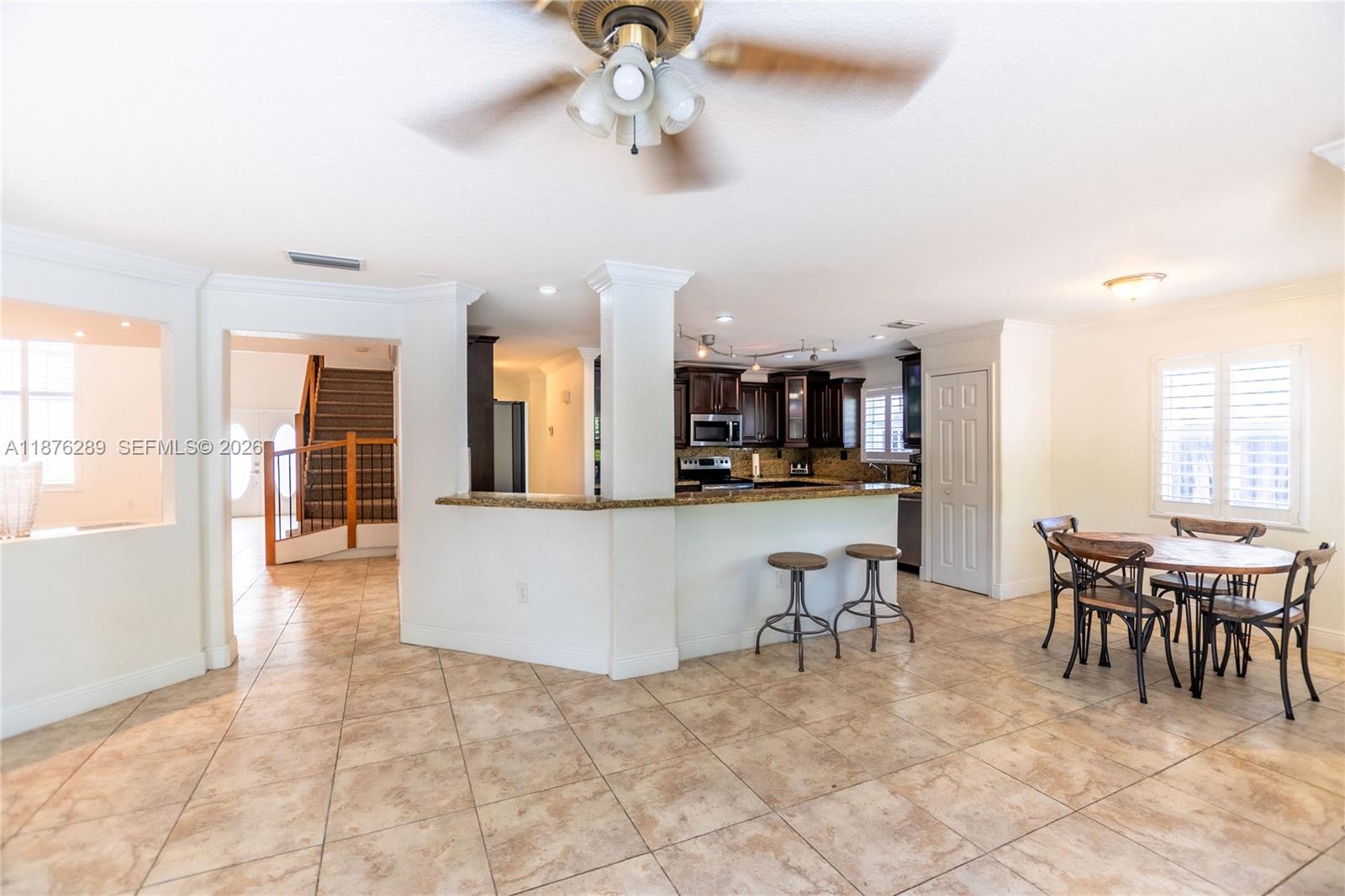 16335 Southwest 93rd Street Miami, FL 33196 - Photo 14 of 70 a view of a dining area with furniture