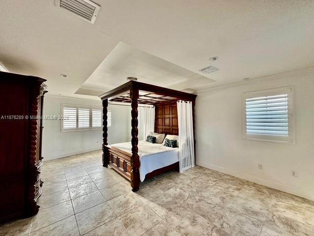 16335 Southwest 93rd Street Miami, FL 33196 - Photo 17 of 29 a room with a bed and a window