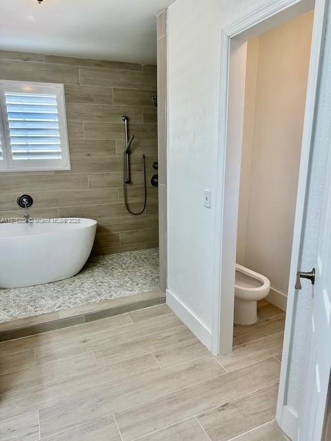 16335 Southwest 93rd Street Miami, FL 33196 - Photo 20 of 29 a bathroom with a granite countertop sink a toilet and shower