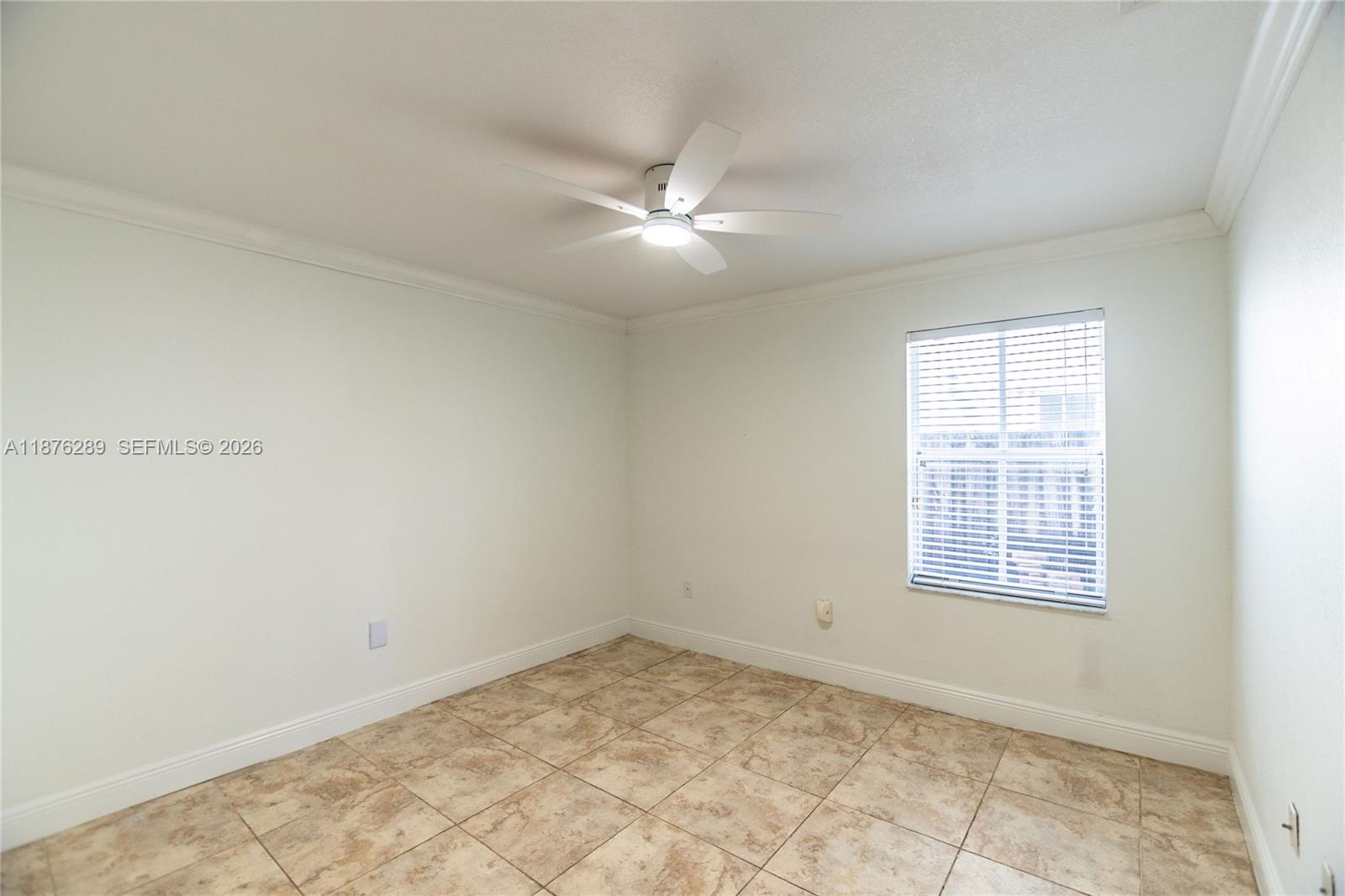 16335 Southwest 93rd Street Miami, FL 33196 - Photo 21 of 70 wooden floor in an empty room with a window