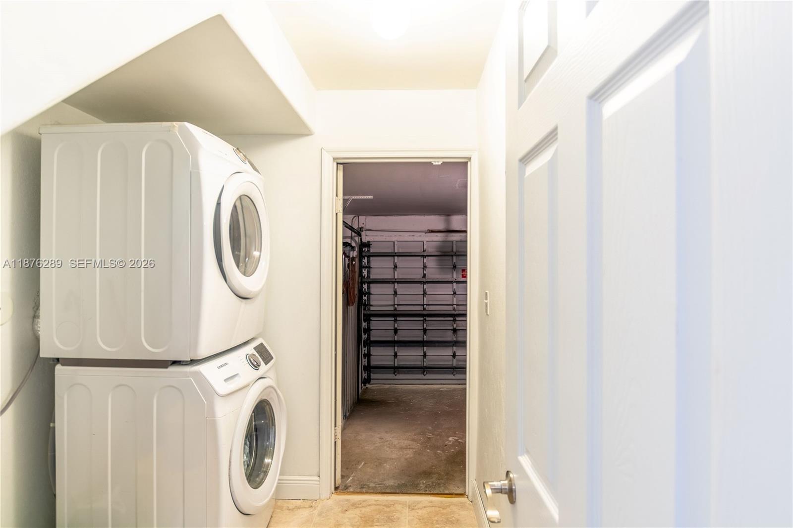 16335 Southwest 93rd Street Miami, FL 33196 - Photo 23 of 70 a utility room with dryer and washer