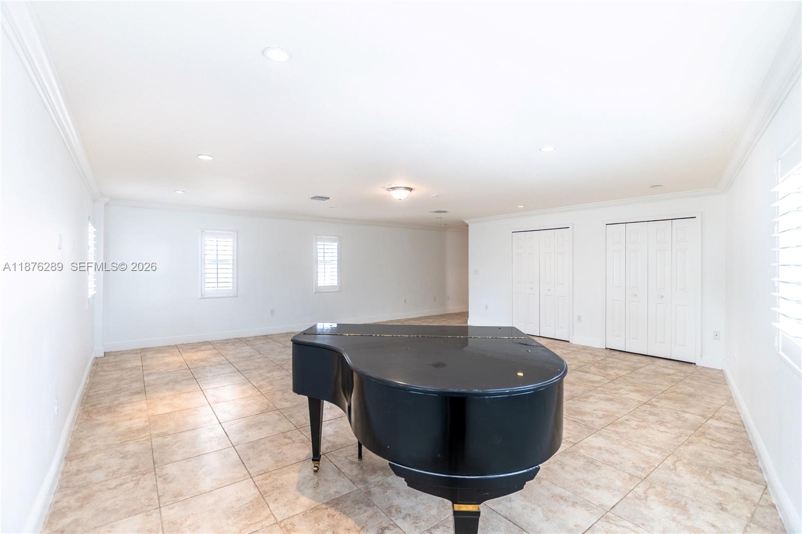 16335 Southwest 93rd Street Miami, FL 33196 - Photo 33 of 70 a room with table and chairs