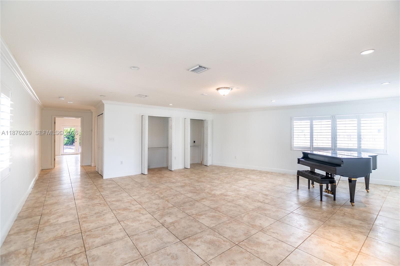 16335 Southwest 93rd Street Miami, FL 33196 - Photo 34 of 70 a view of a livingroom with furniture and an window