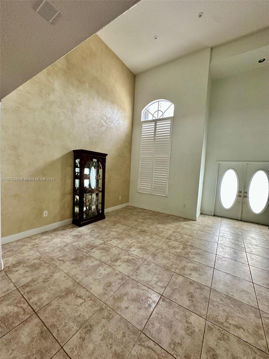 16335 Southwest 93rd Street Miami, FL 33196 - Photo 4 of 29 a view of a livingroom with a yard