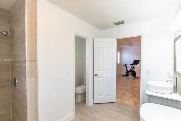 a picture of a bathroom with a sink