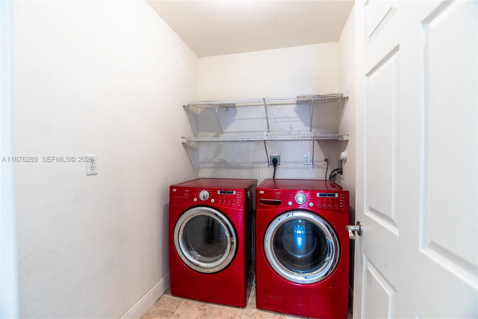 16335 Southwest 93rd Street Miami, FL 33196 - Photo 50 of 70 a utility room with dryer and washer