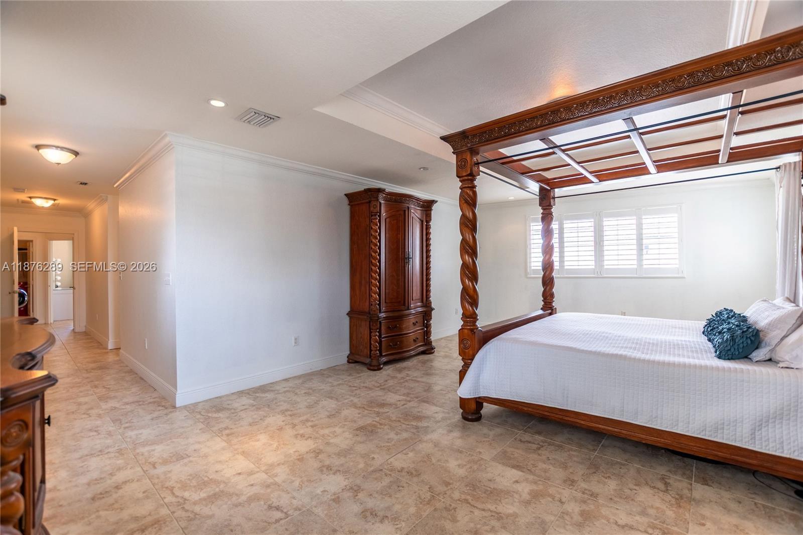 16335 Southwest 93rd Street Miami, FL 33196 - Photo 56 of 70 a bed room with a bed and a window